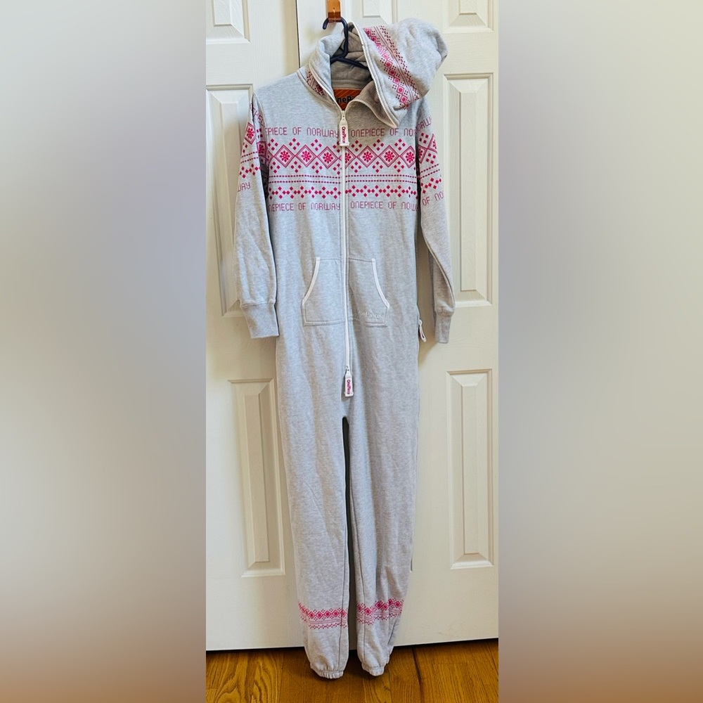 OnePiece zip up jumpsuit. Brand new never worn women’s side pockets, hoodie